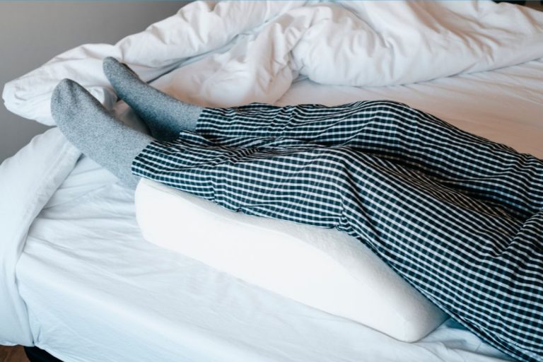 Pros & Cons Of Sleeping With Legs Elevated